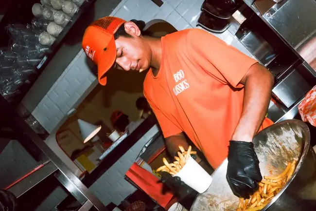 B60 Burgers staff making fries kitchen